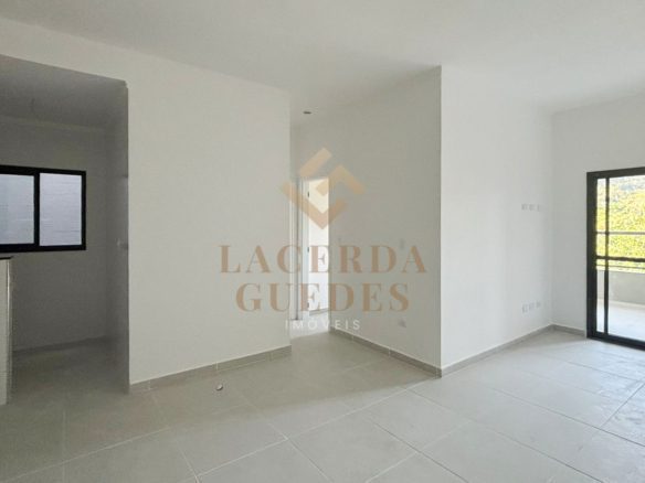 Sala integrada de apartamento no centro de Ubatuba