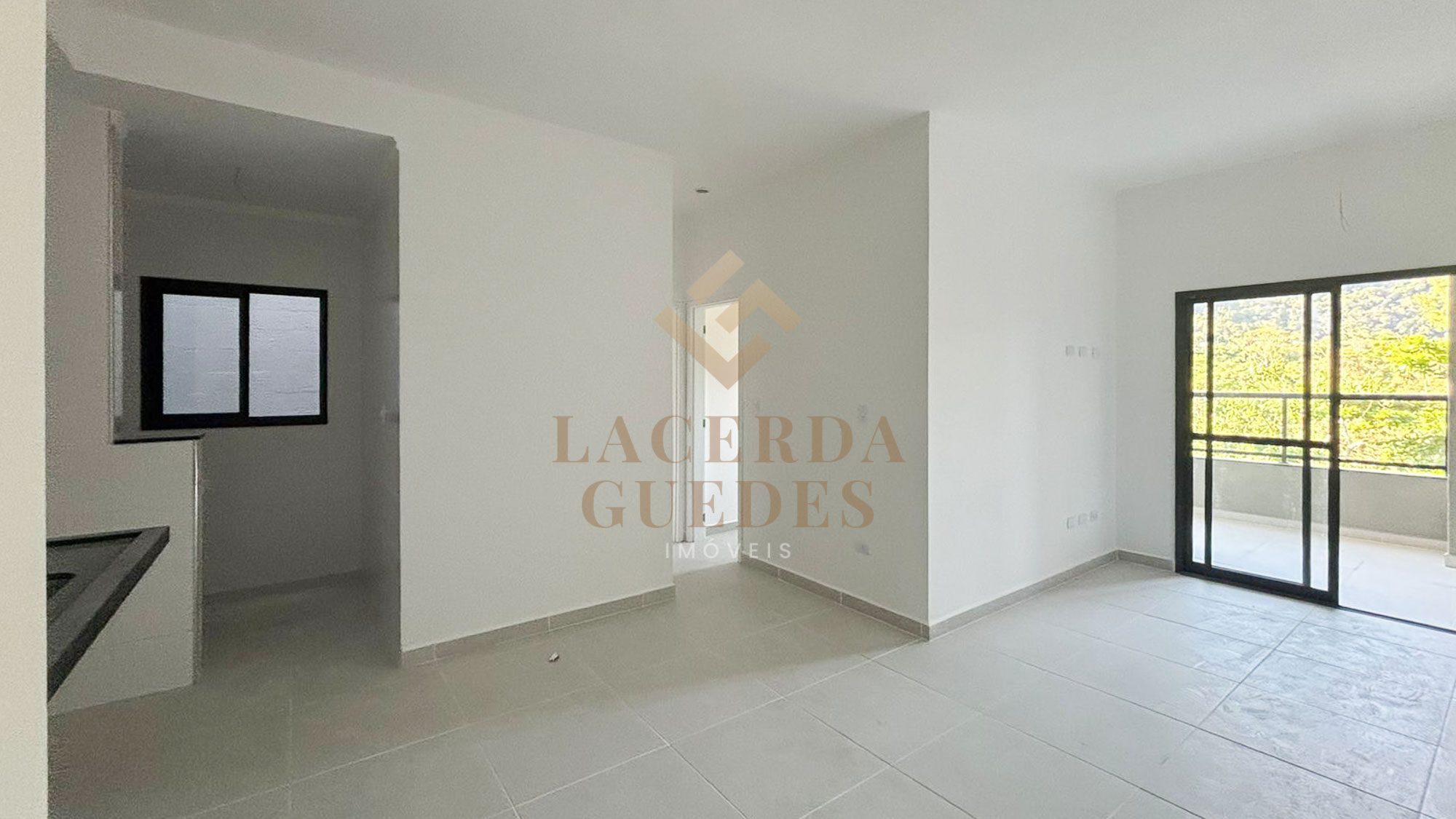 Sala integrada de apartamento no centro de Ubatuba