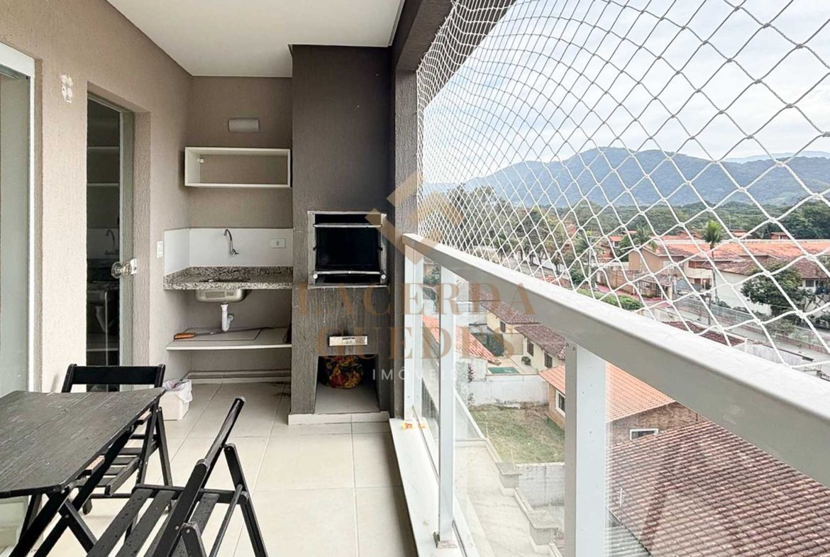 Varanda gourmet com churrasqueira e vista externa