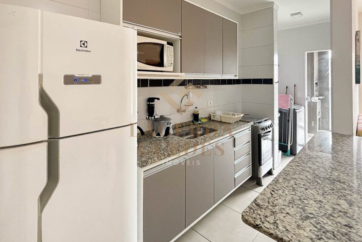 Sala de estar do apartamento no Itaguá