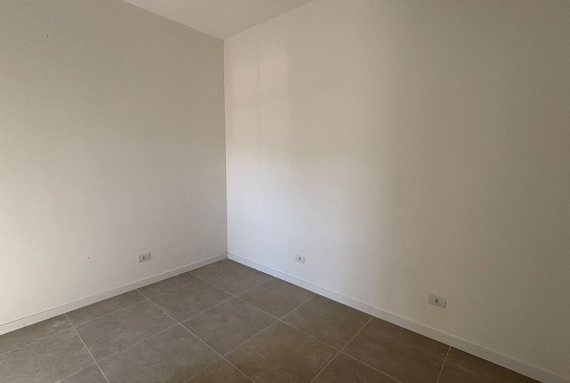 Dormitório da unidade de 73 m²