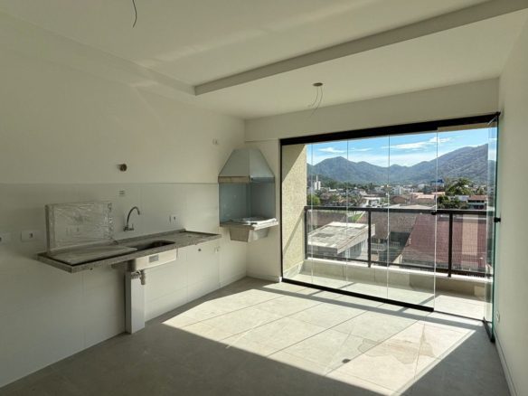 Sala integrada à varanda gourmet do apartamento no Duo Itaguá