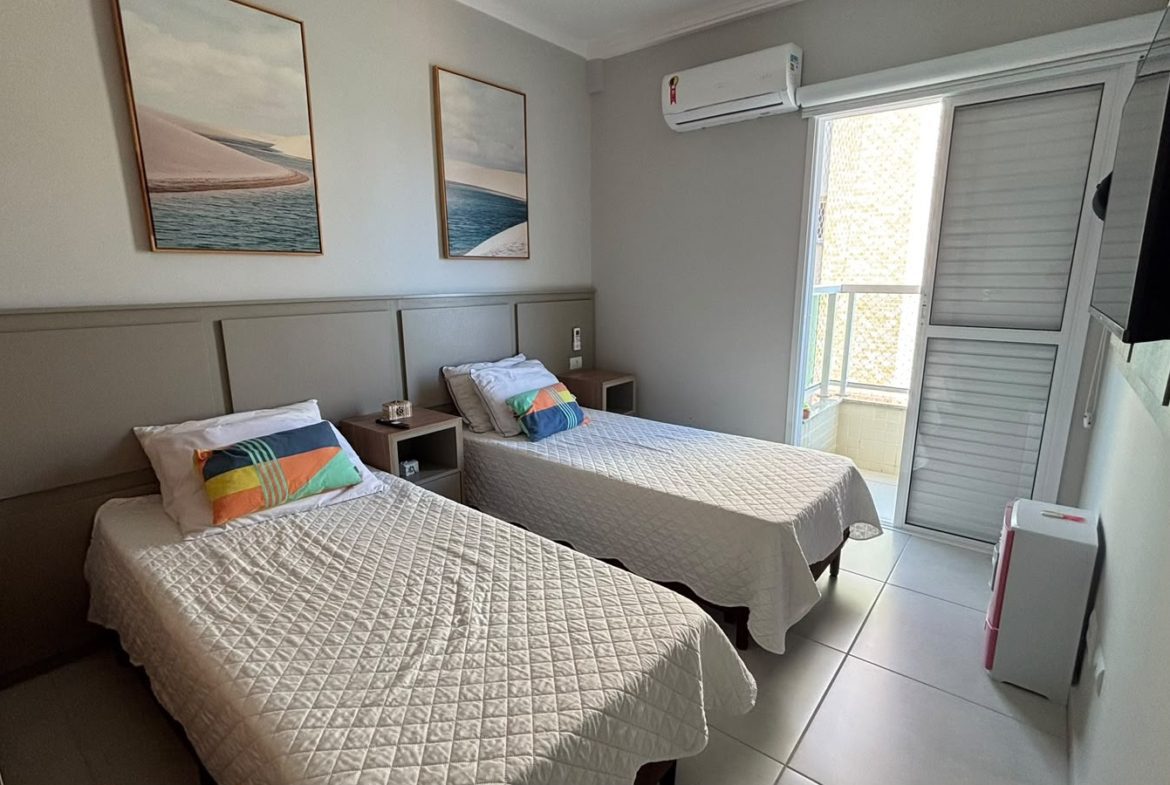 Dormitório mobiliado do apartamento