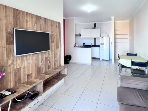 Sala de estar do apartamento de 65 m² no Itaguá