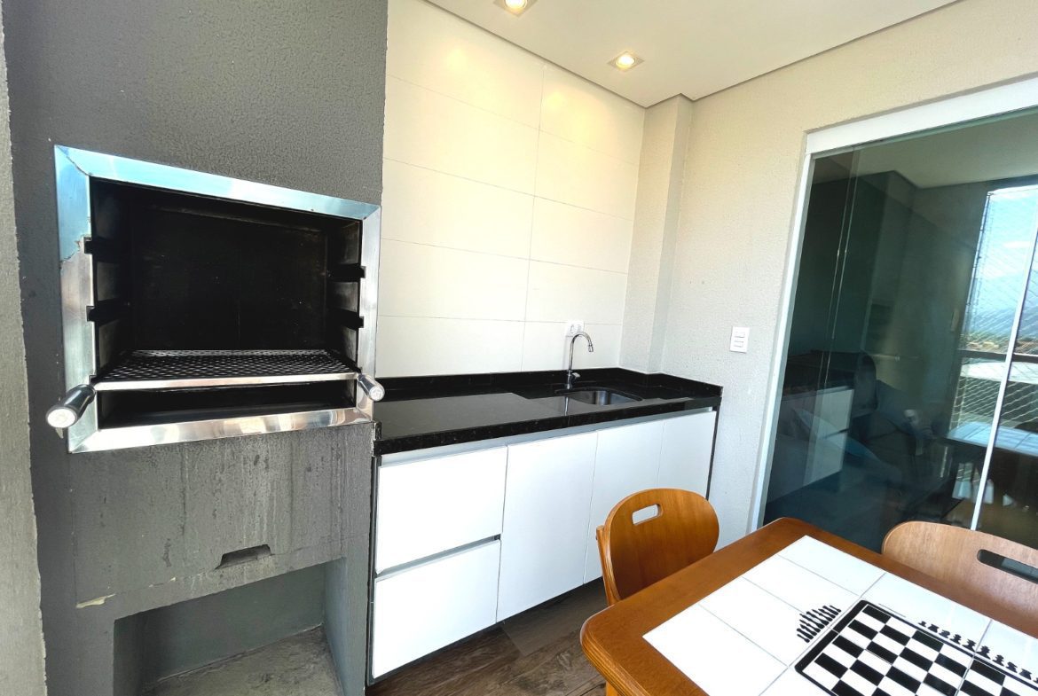 Varanda gourmet do apartamento no 4º andar