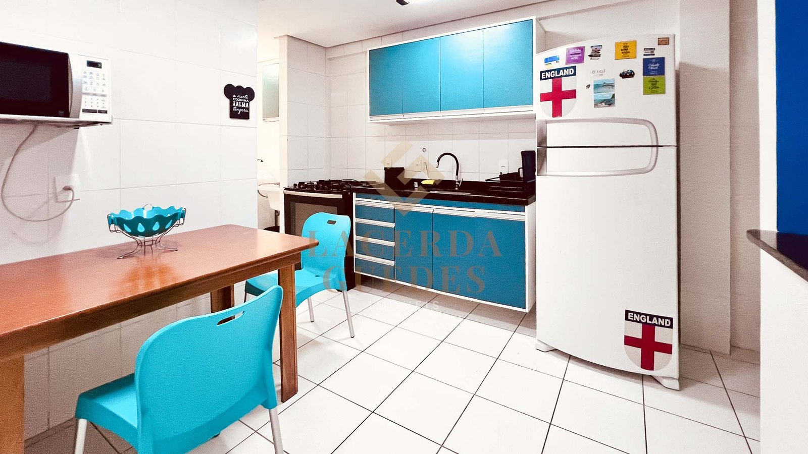apartamento-garden-praia-grande-ubatuba-11 Cozinha americana com móveis planejados