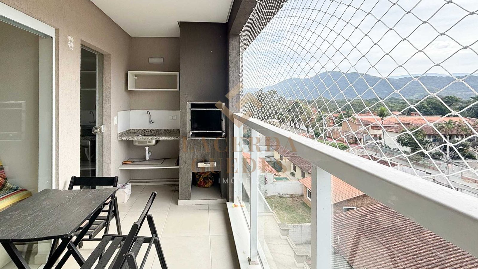 apartamento-itagua-75m2-varanda-gourmet-13 Varanda gourmet com churrasqueira e vista externa