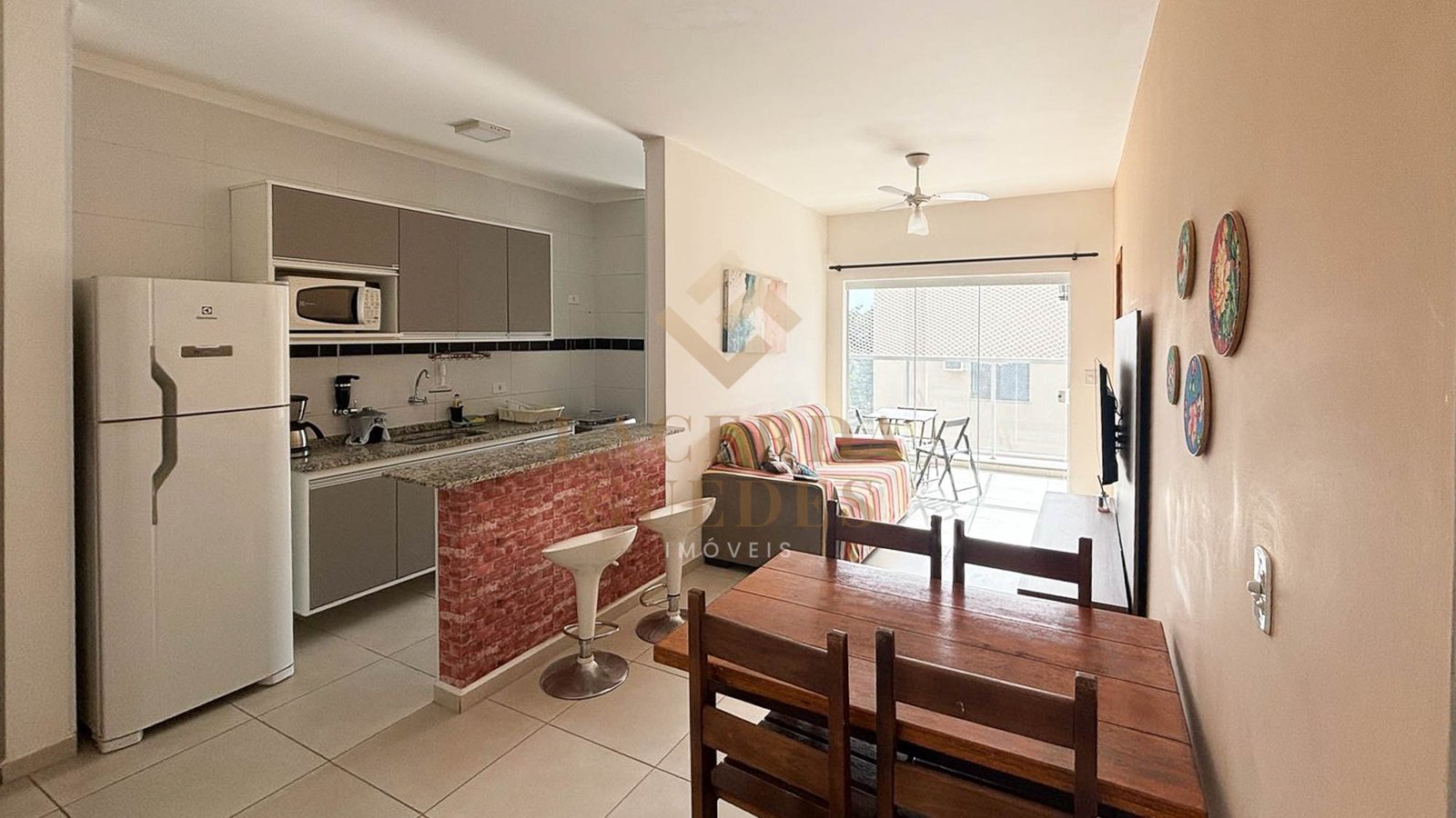 apartamento-itagua-75m2-varanda-gourmet Sala de jantar integrada à cozinha do apartamento no Itaguá
