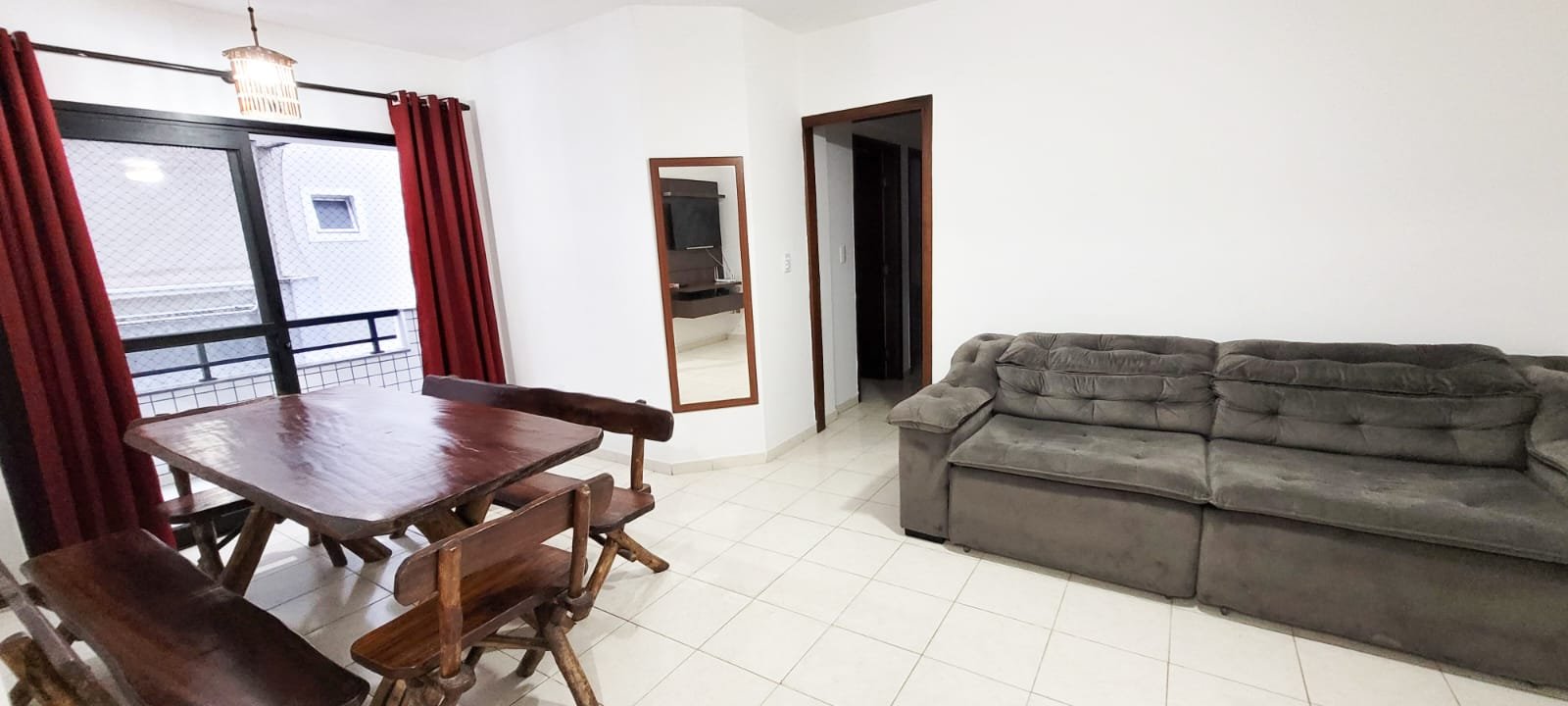 apartamento-3-dormitorios-centro-ubatuba (8) Área de jantar integrada à cozinha