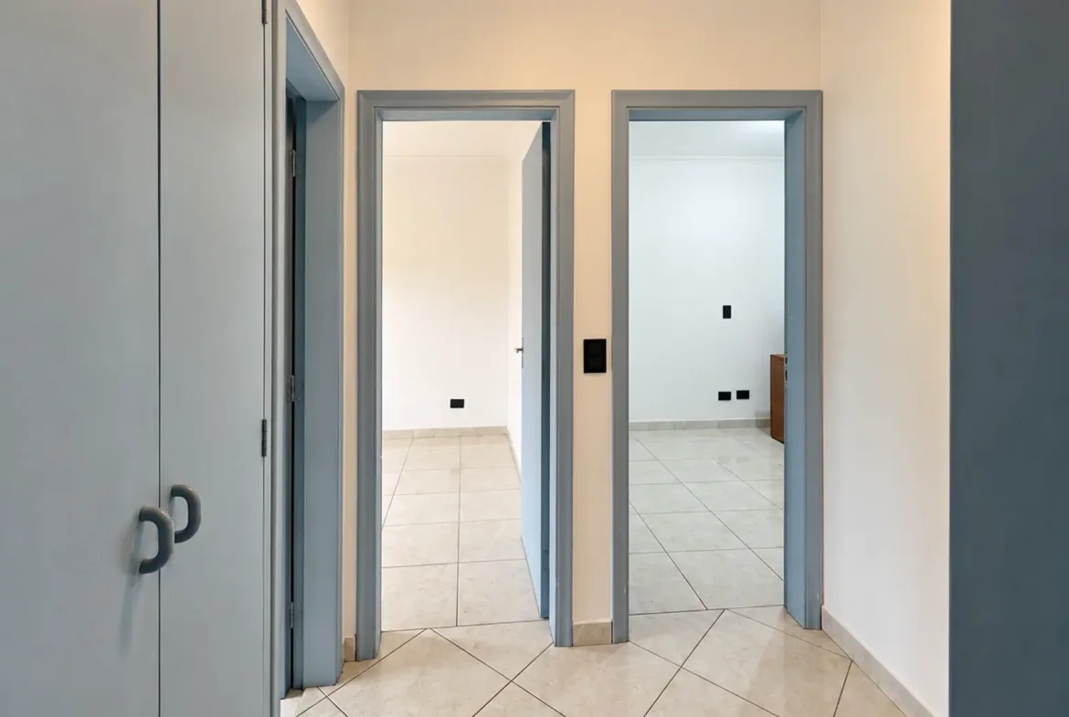 Corredor de acesso aos dormitórios do apartamento