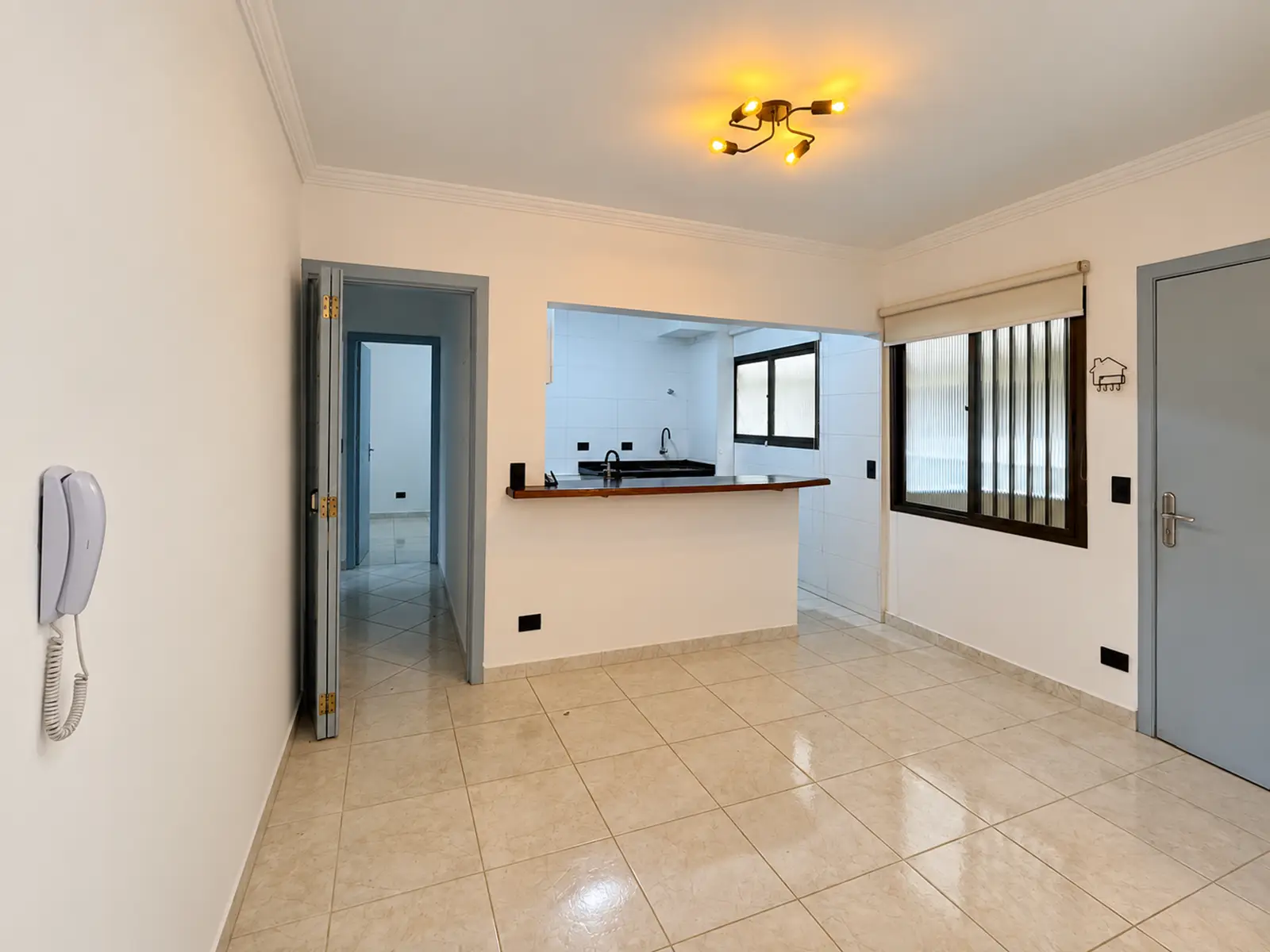 apartamento-centro-ubatuba-90m2-lg105-cozinha-integrada Cozinha integrada à sala do apartamento