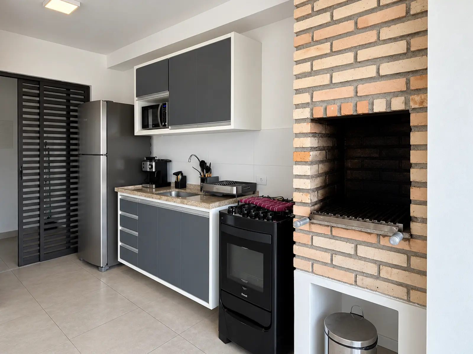 apartamento-duo-itagua-112m2-varanda-churrasqueira Varanda com churrasqueira do apartamento no Duo Itaguá
