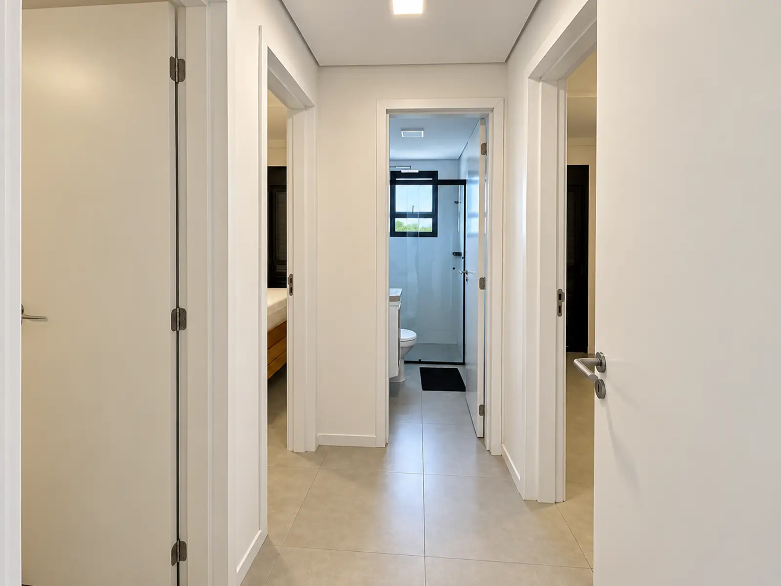 apartamento-duo-itagua-hall Hall de circulação do apartamento no Duo Itaguá