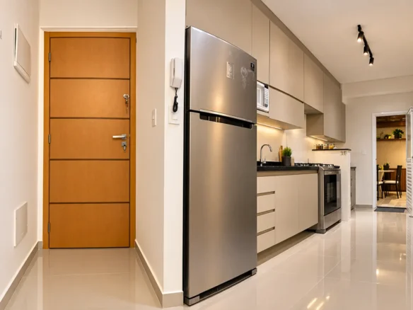 Cozinha integrada com armários do apartamento garden LG104