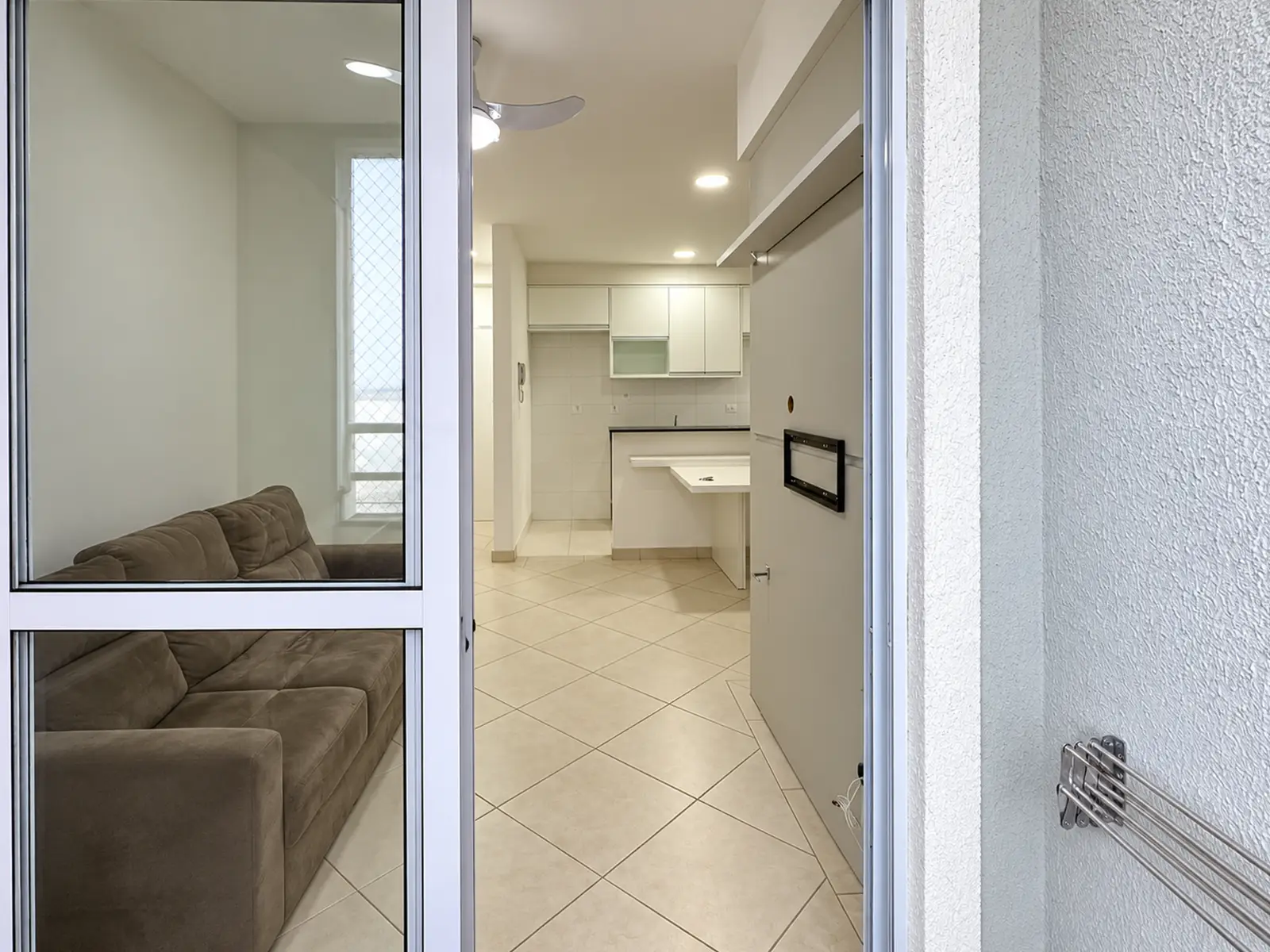 apartamento-itagua-51m2-lg106-varanda-gourmet Varanda gourmet do apartamento no Itaguá
